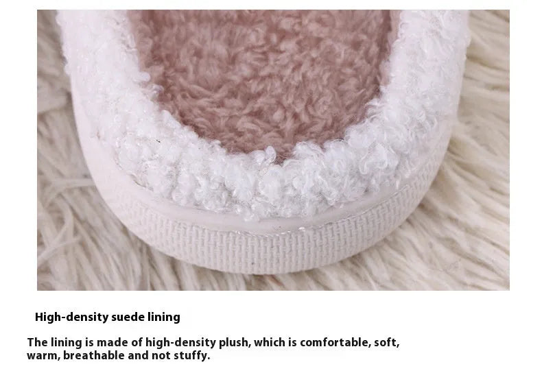 White cartoon pattern fluffy slippers with a non-slip rubber sole and toe holder design.