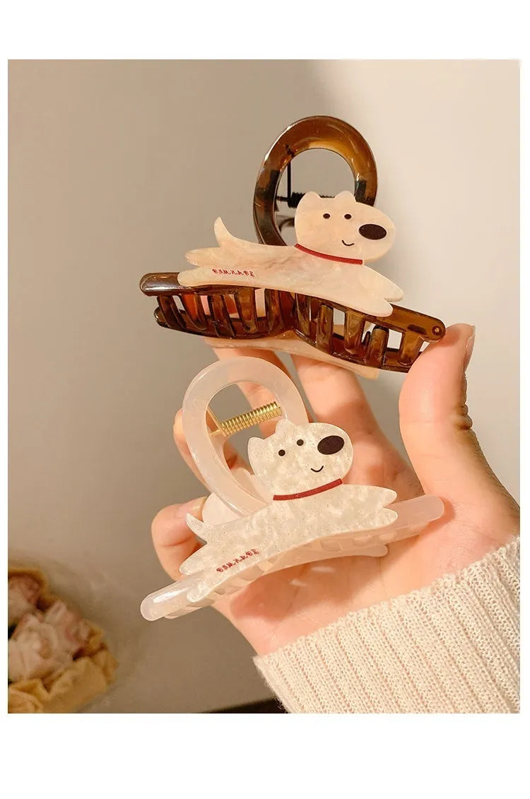 Cartoon puppy design hair barrettes in beige and brown colours with grip mechanism