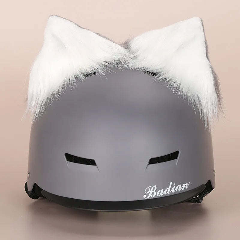 Soft plush cartoon character cover stretched over a pair of black on-ear headphones.