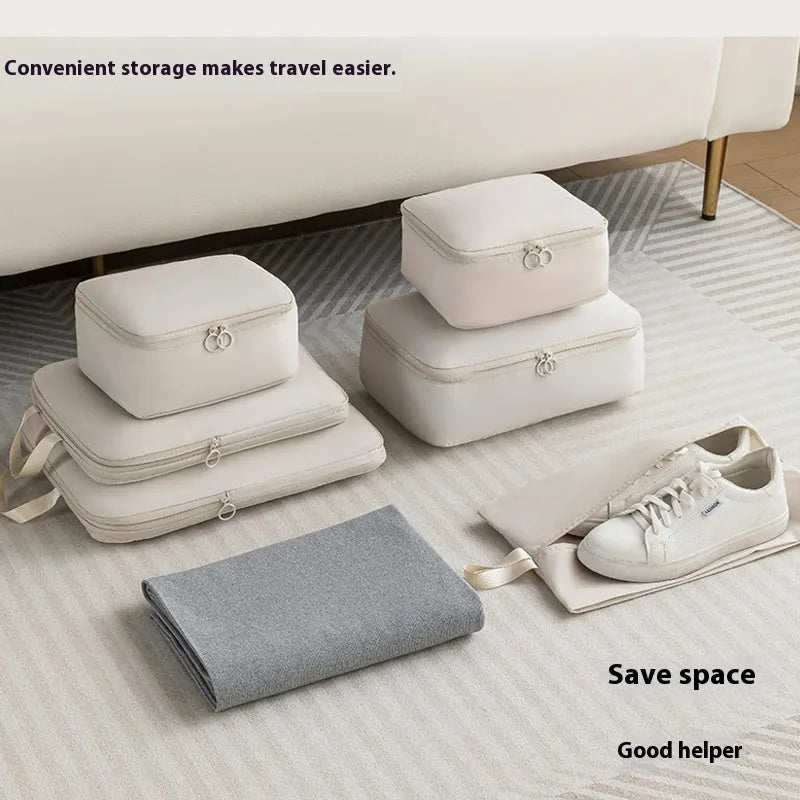 Travel buggy bag in memory cloth with polyester lining, six-piece compressed clothing set, 36-55L capacity, solid colour