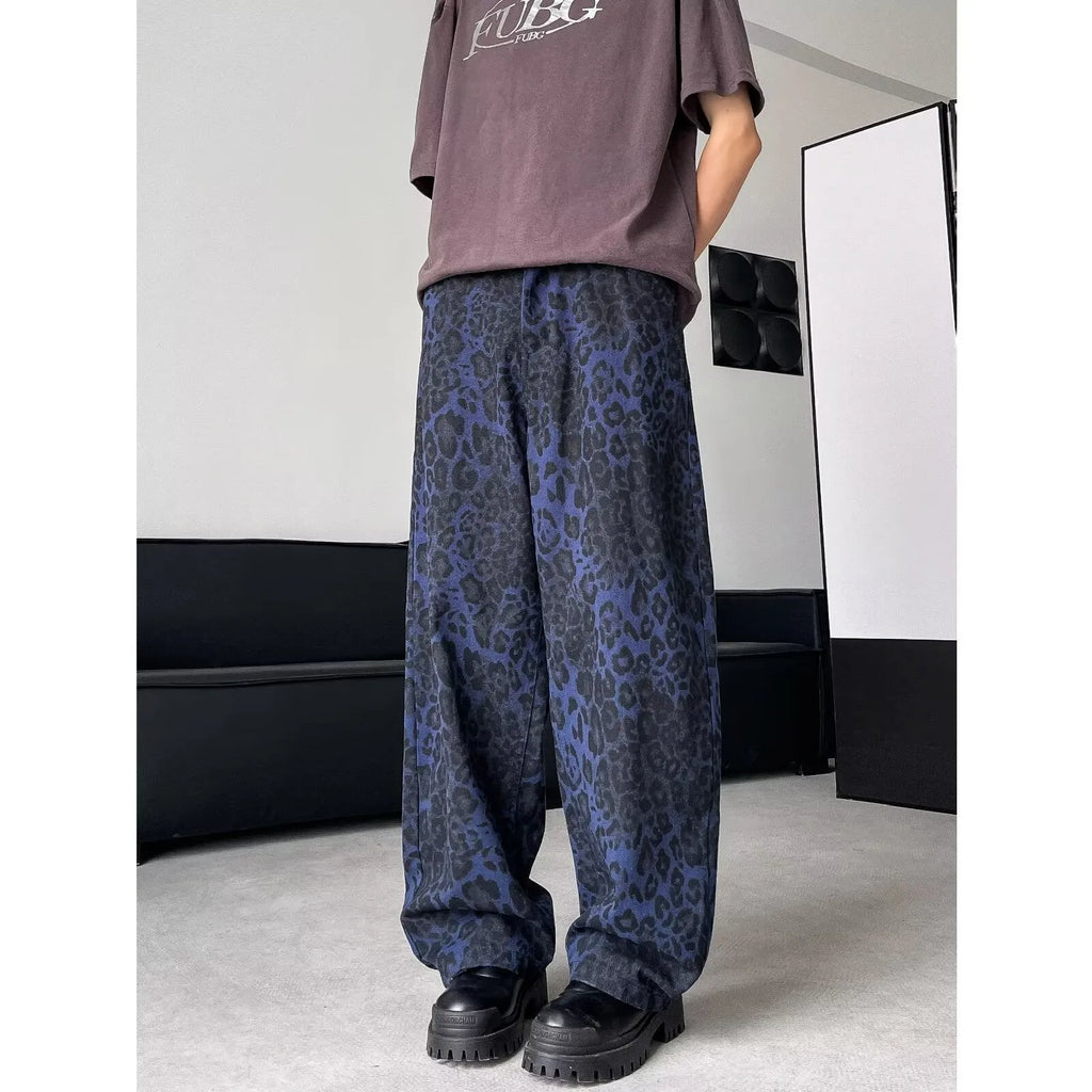 Blue cotton leopard print wide-leg pants with zip fly, full-length view
