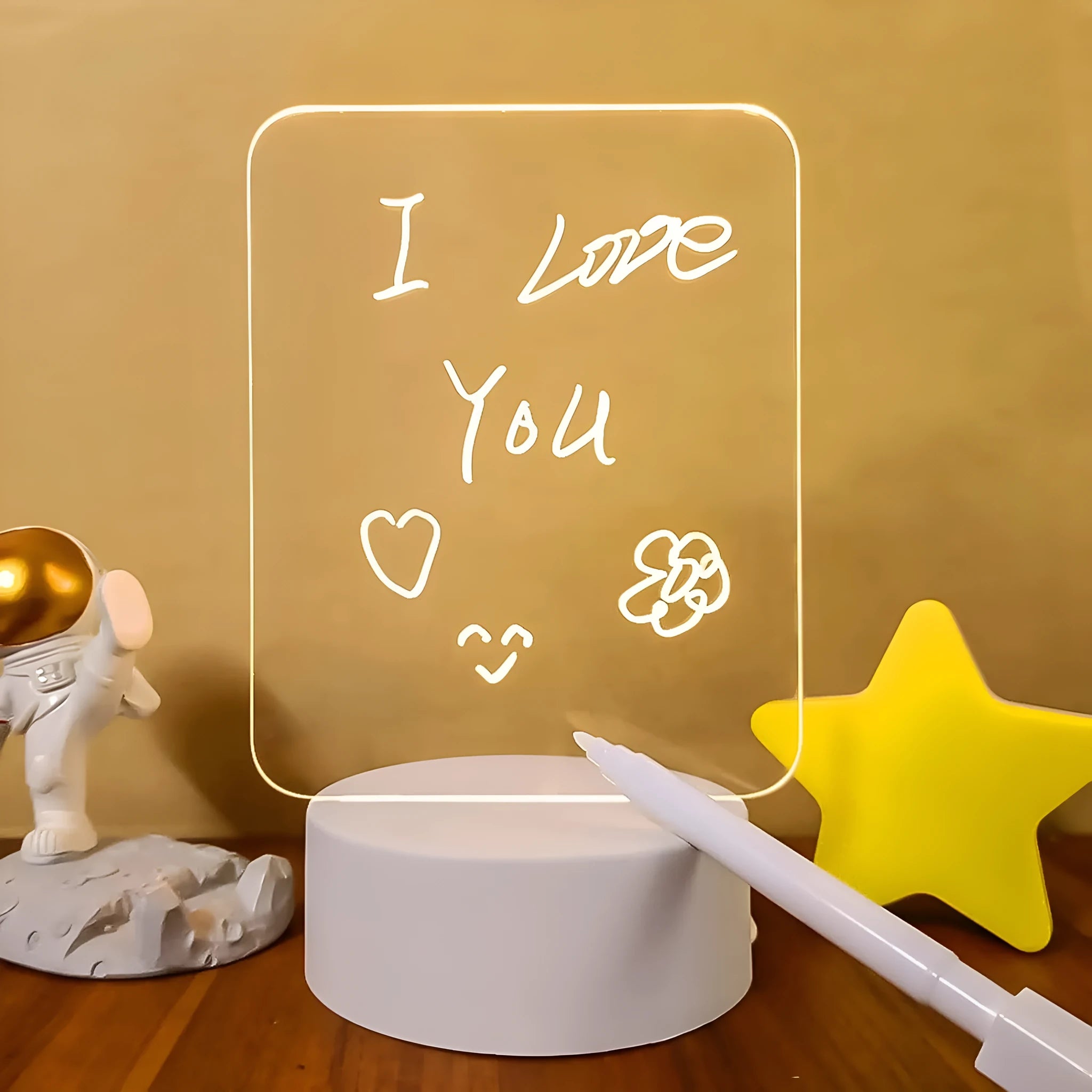 Acrylic message board night lamp with warm light showing round base and multiple picture shape options