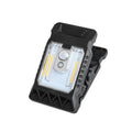 White intelligent motion sensor clip lamp mounted on a shelf edge.
