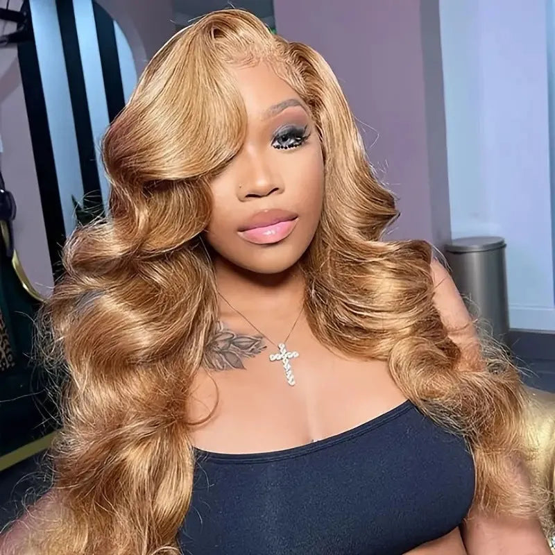 Long light brown curly wig with golden big waves and side bangs on a mannequin head.