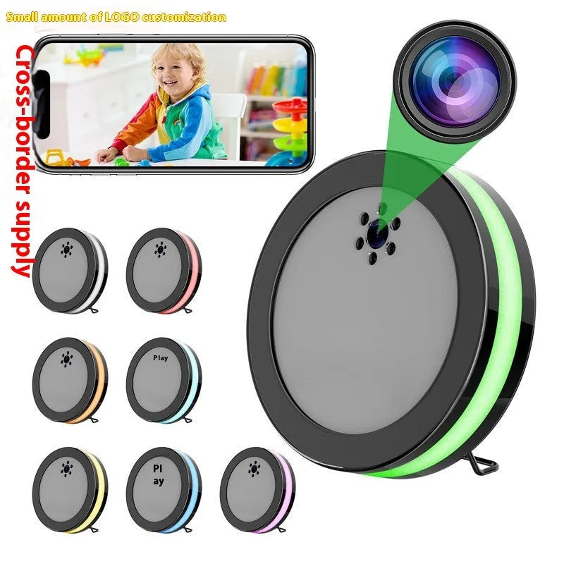 Black wireless smart surveillance camera with night vision and voice conversation on a desk