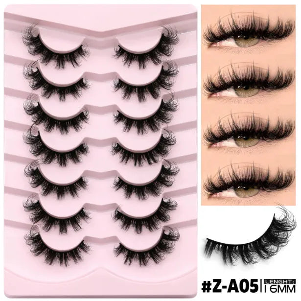 Box of black artificial fibre false eyelashes in a natural thick style with a tube of adhesive glue.