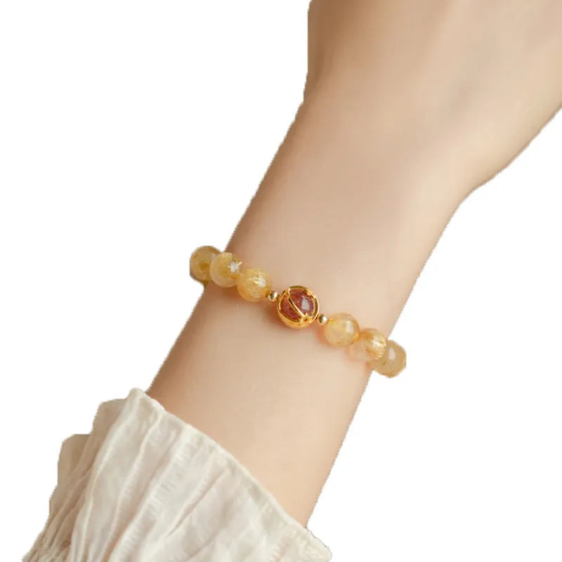 Gold rutilated quartz crystal bracelet with diamond-shaped beads in unisex Korean style