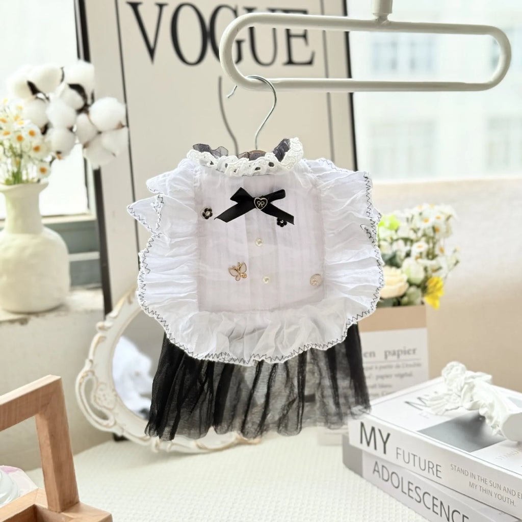 White yarn-trimmed polyester gauze skirt for a small dog on a mannequin, showing princess style.