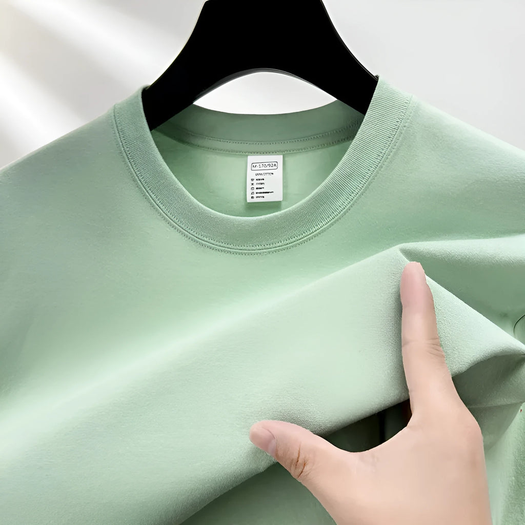 Men's thin cotton t-shirt with drop shoulder design in solid colour options like beige, sky blue, and pitaya