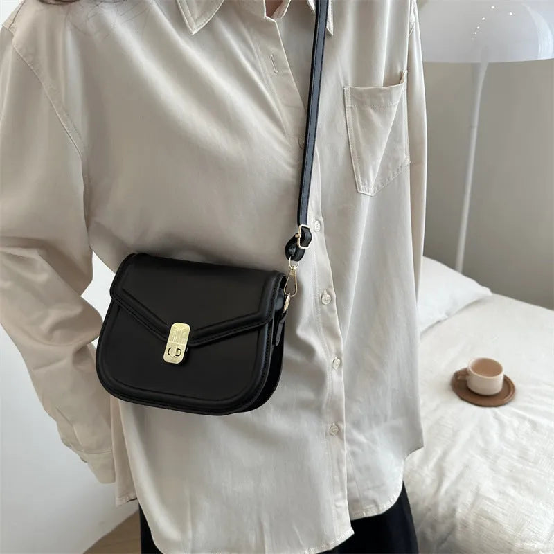 Soft PU leather clamshell messenger bag in horizontal square shape, shown in khaki colour.