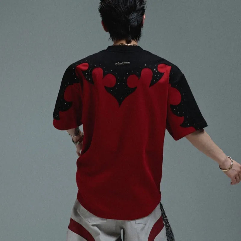 Men's grey short sleeve shirt with 3D burnt flower stitching and rhinestone details on a drop-shoulder loose fit.