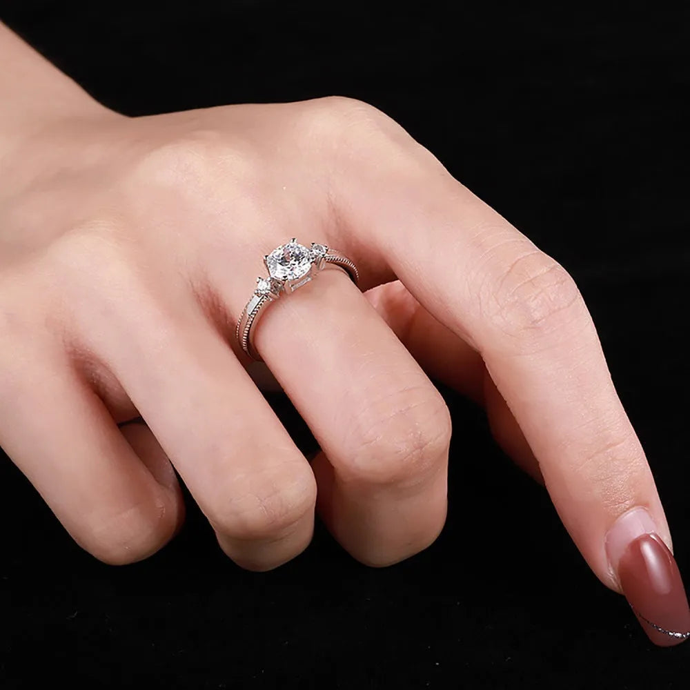 Women's classic four-claw silver ring with electroplated finish in AY120209 colour, shown on a neutral background.