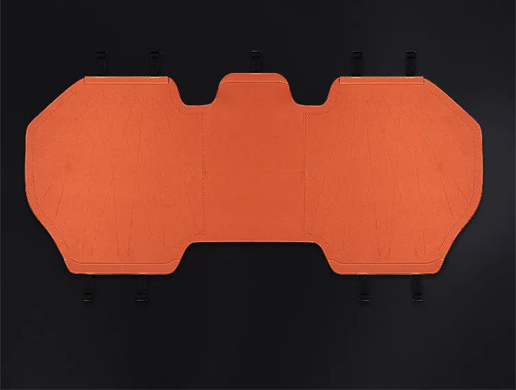 Ultra-thin genuine fur car seat cover in Hermes Orange colour with gradient hole pattern.