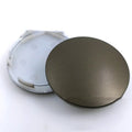 65mm diameter car wheel hub centre cap in antique copper finish with metal emblem.