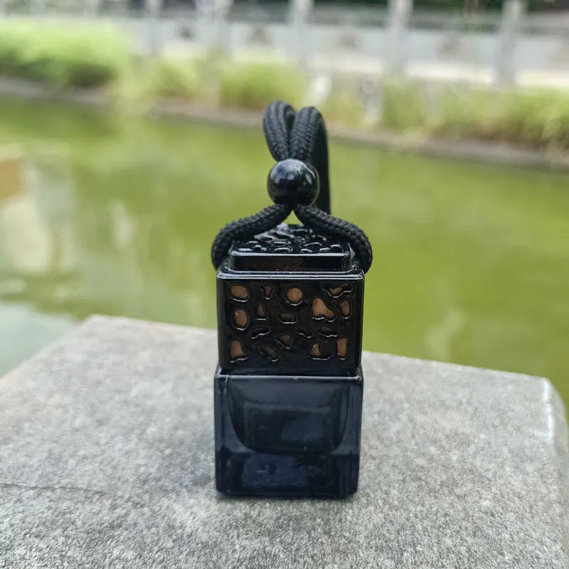Glass car perfume bottle pendant 8ml hollow design with transparent finish hanging from rearview mirror