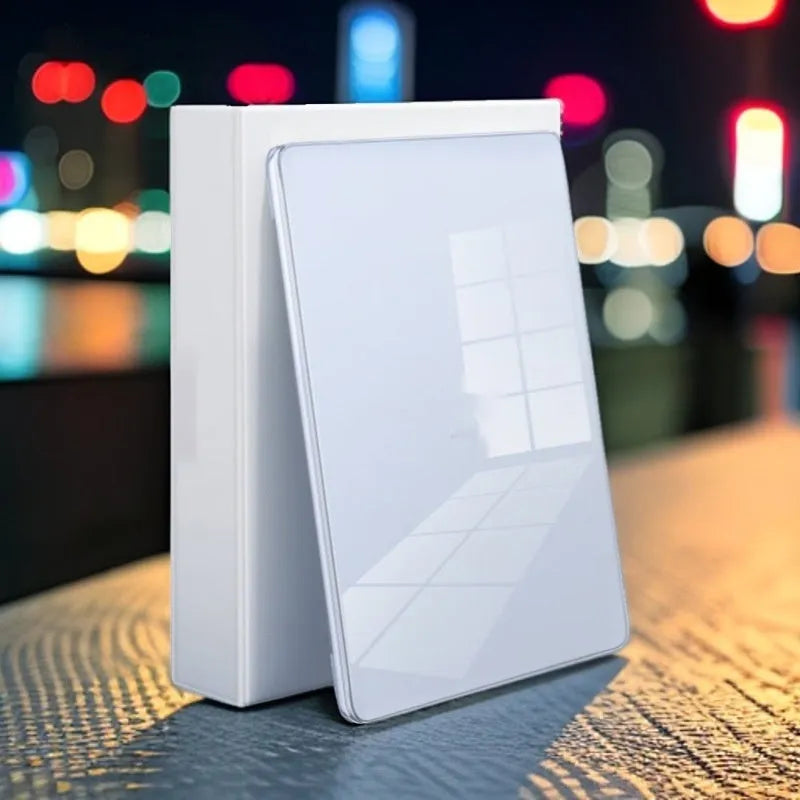 Clear hard plastic protective case for a MacBook laptop on a table.