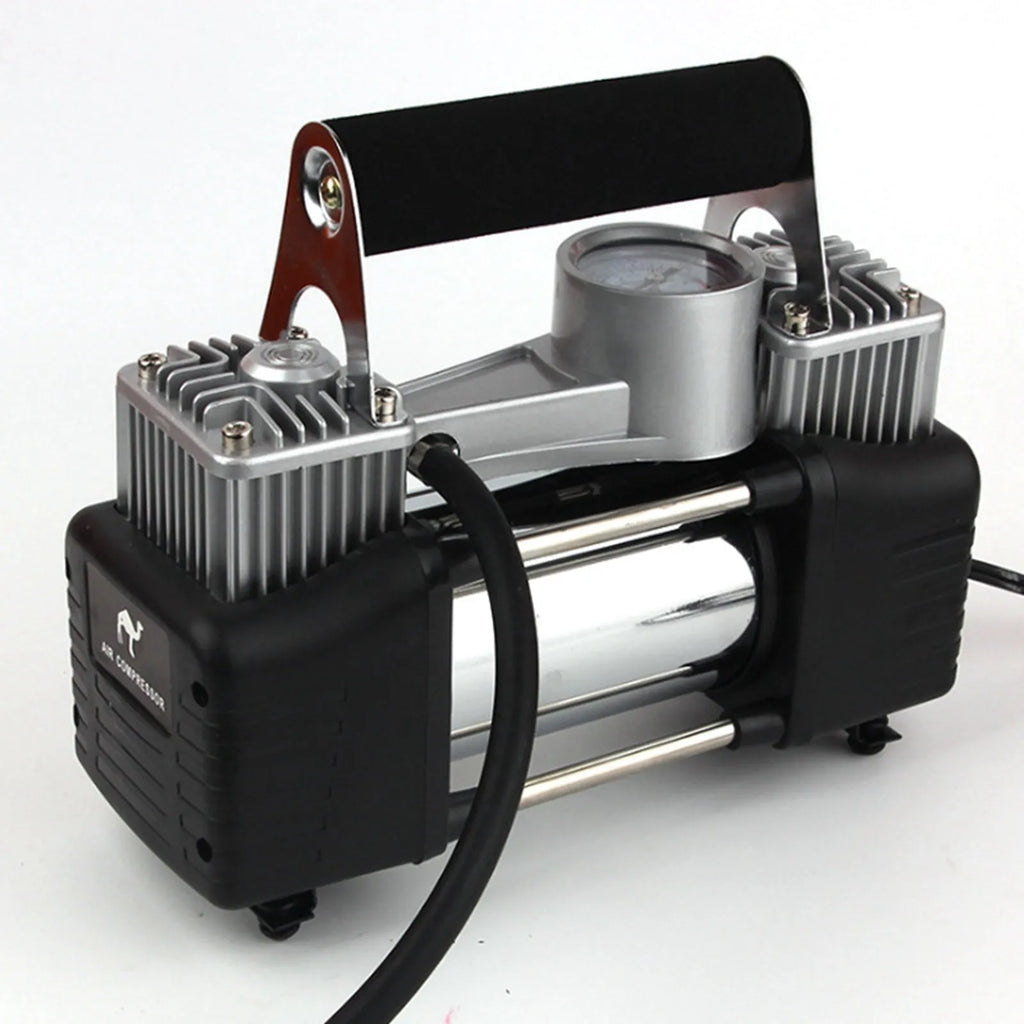 High power metal double cylinder 12V car air pump with battery clips and nozzle kit on black background