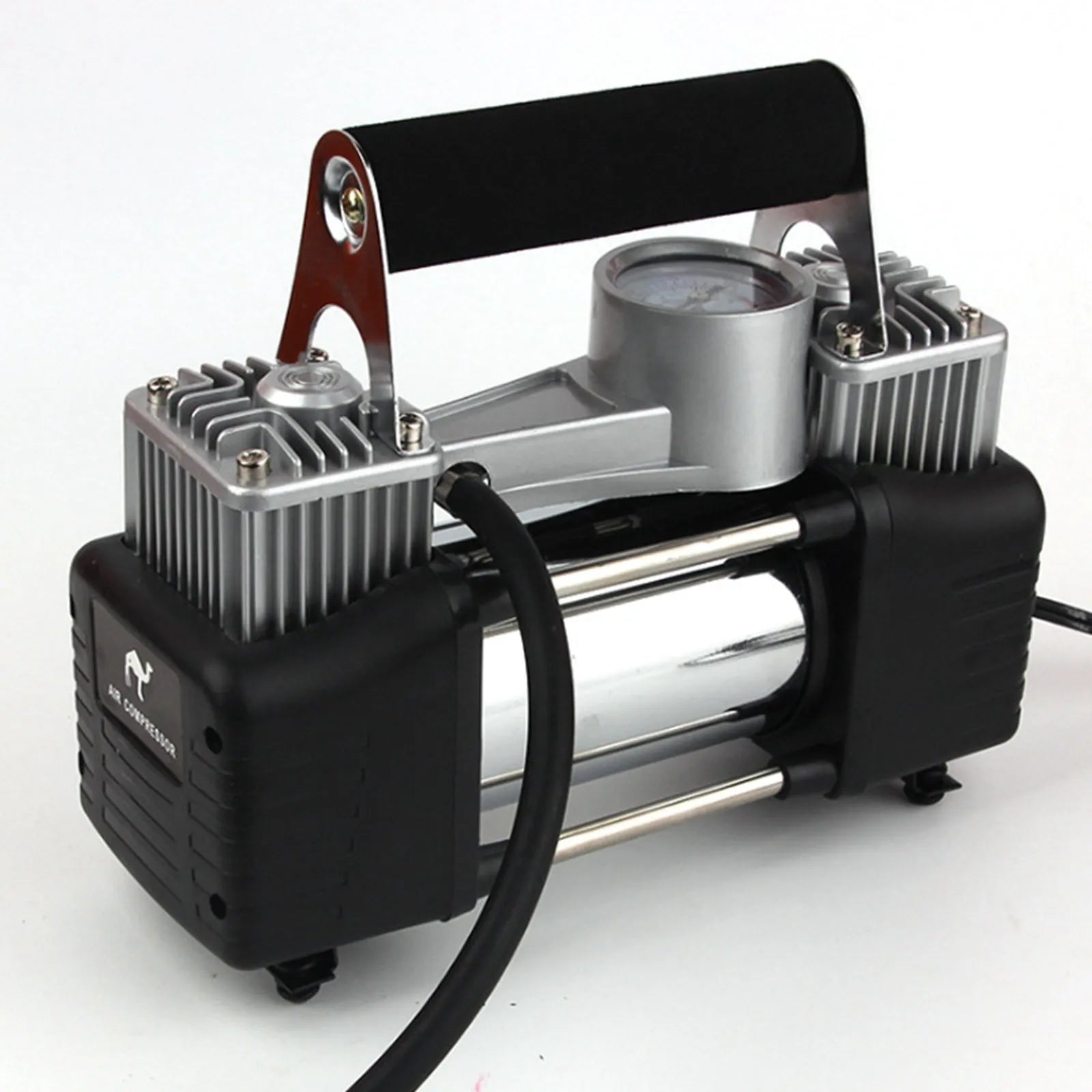 High power metal double cylinder 12V car air pump with battery clips and nozzle kit on black background