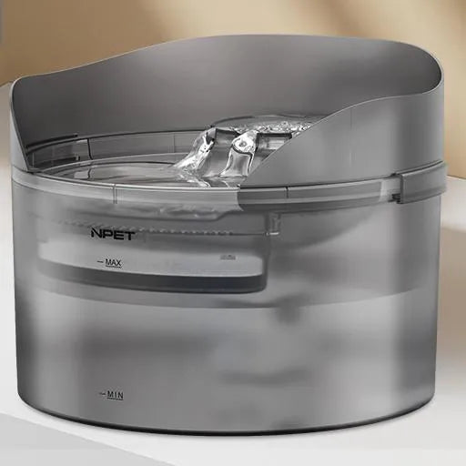 Automatic circulating water dispenser for dogs and cats with filter cartridge.