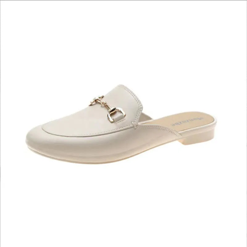 Women's PVC closed toe half slippers with buckle fastening in white, black and brown colours