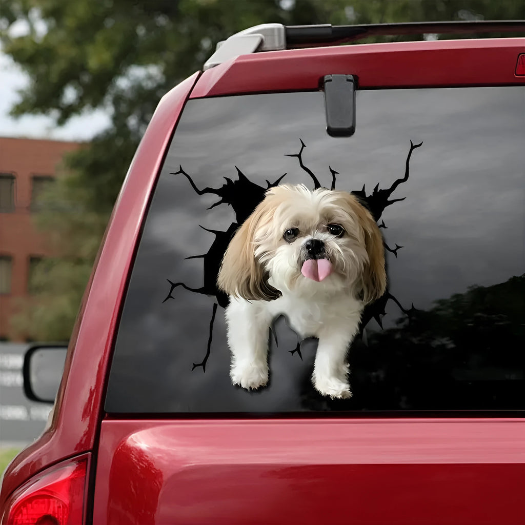 Tearing-style dog silhouette reflective window sticker on a glass surface, showing three available sizes.