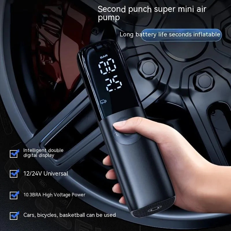 Black portable electric car air pump with tyre pressure gauge and plug