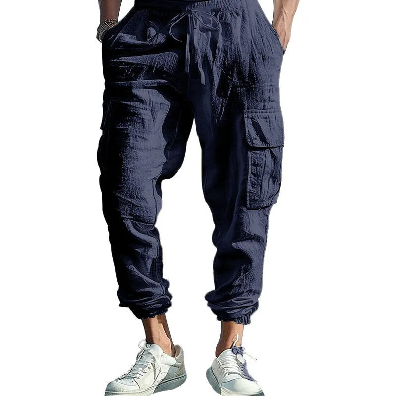 Men's loose-fit linen casual trousers with ankle ties and multiple pockets in Army Green.