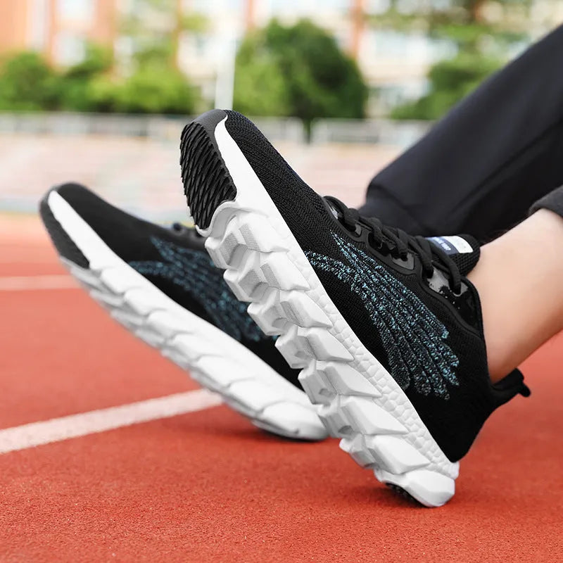 Low-top black and white running sneakers with cross-strap detail and flat MD sole.