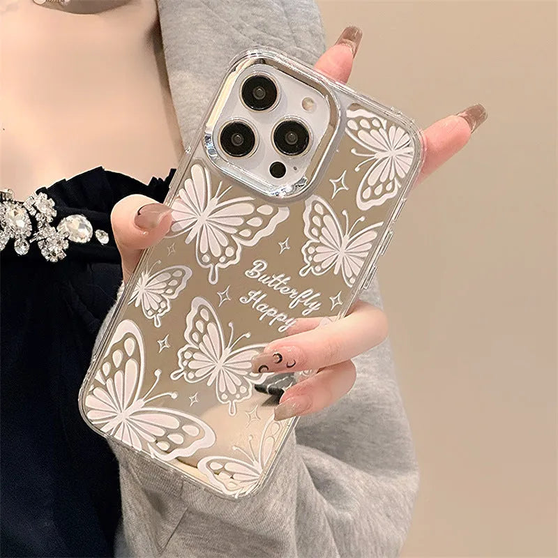 Transparent iPhone 15 Pro Max case with integrated mirror and bow decoration on back