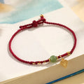 Handmade 925 silver and Hetian jade woven bracelet for women with red strap