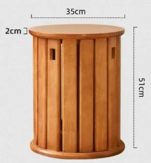 Two stackable round iron stools with splayed legs in a modern kitchen, showing smoked black and cream white colour options.