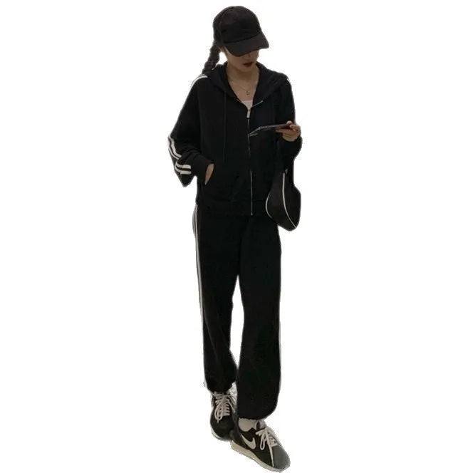 Women's striped two-piece trouser suit set in light grey or black, polyester, sizes M to XXL