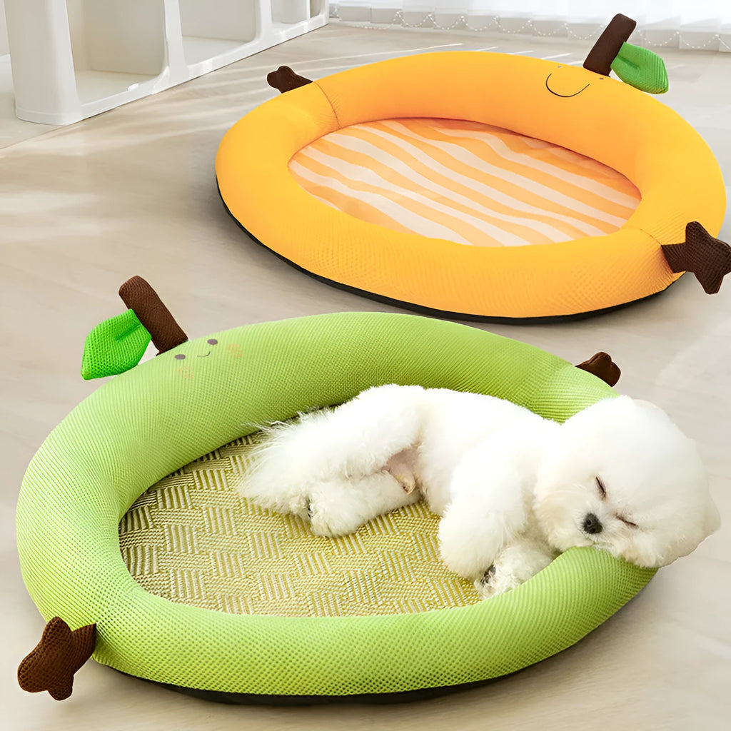 Green pet cooling mat with a raised fruit-shaped backrest, sized for a large dog.
