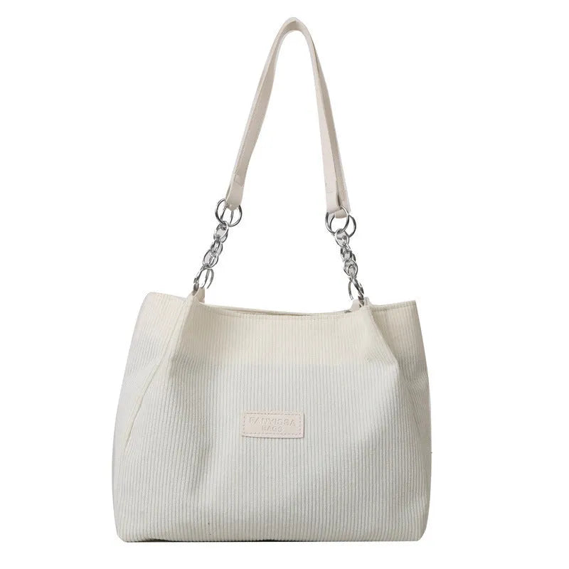 Corduroy one-shoulder tote handbag in black, white or brown with three-dimensional pocket