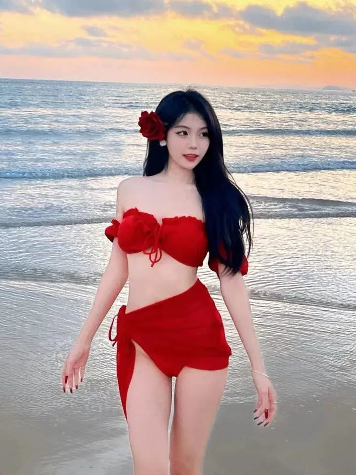 Women's red puff sleeve bikini set with skirt top and solid colour briefs on mannequin