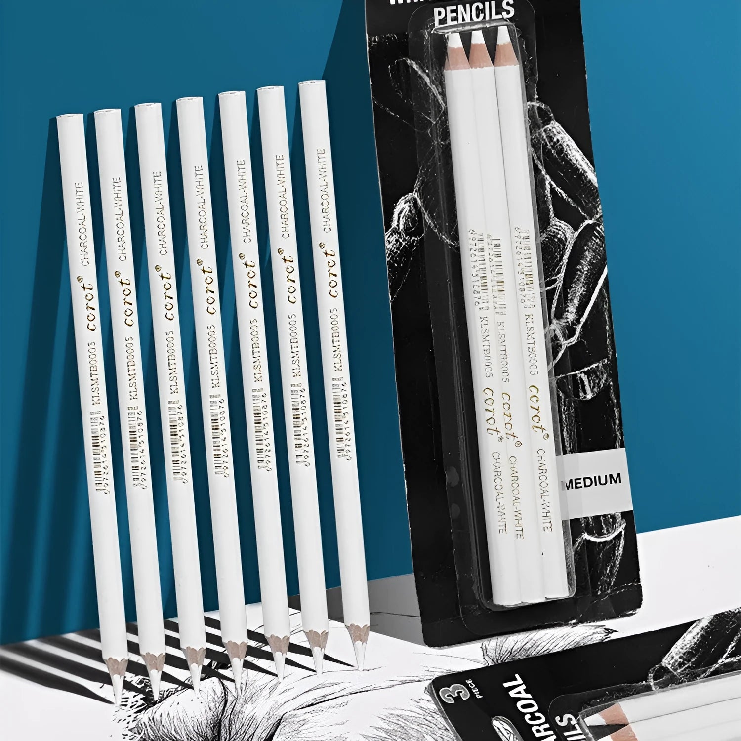 Three white charcoal drawing pencils for sketching and highlighting artwork.