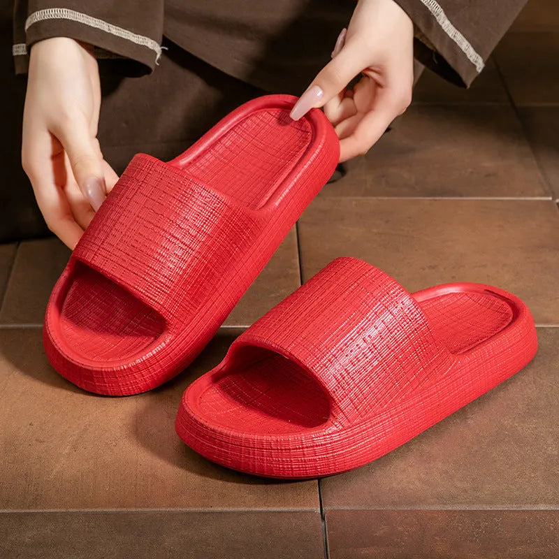 Women's soft EVA non-slip toe ring flip-flop slippers in five colour options.