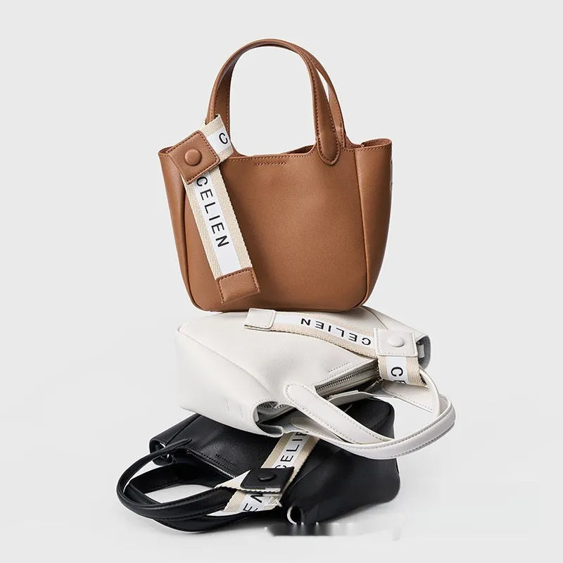 Genuine cattlehide leather retro cross body bucket bag in square vertical shape shown in brown colour.
