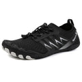 Low-top river tracing shoes in apricot colour with mesh upper and rubber sole.
