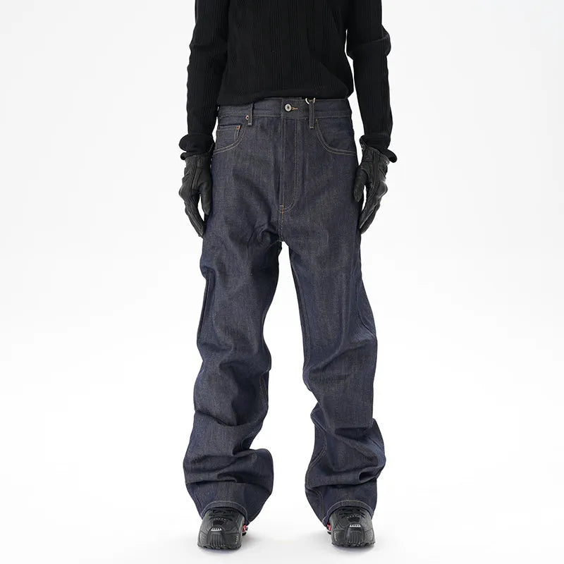 Dark blue loose straight-leg casual jeans on a neutral background.