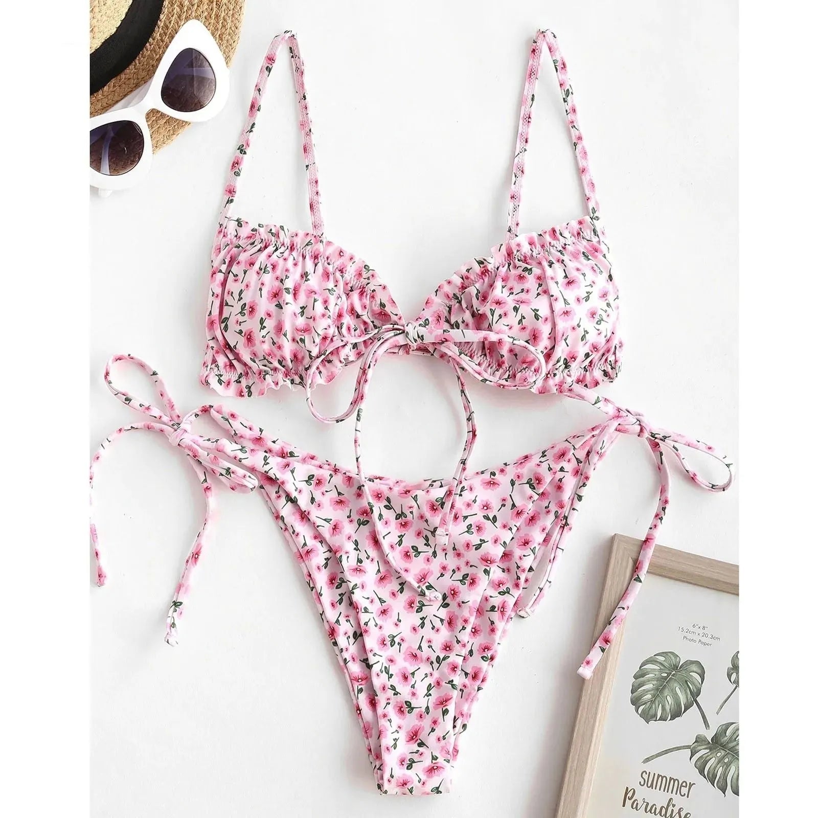 Blue printed women's bikini with multi-rope banding detail on short sleeves and lapel collar.