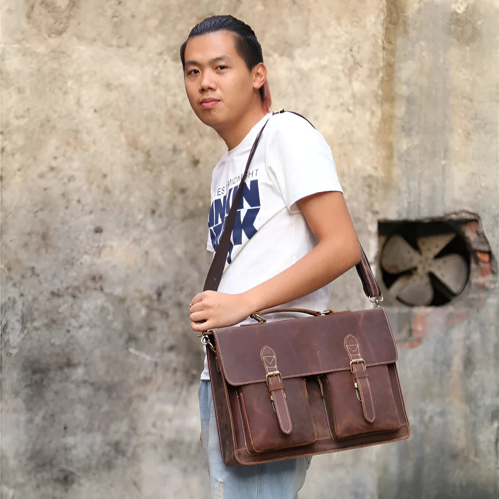 Yellow brown Crazy Horse leather messenger bag with shoulder strap and cowhide construction