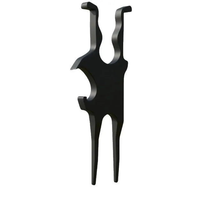 Black aluminium alloy golf turf repair tool 10.1 by 3.8 cm on grass