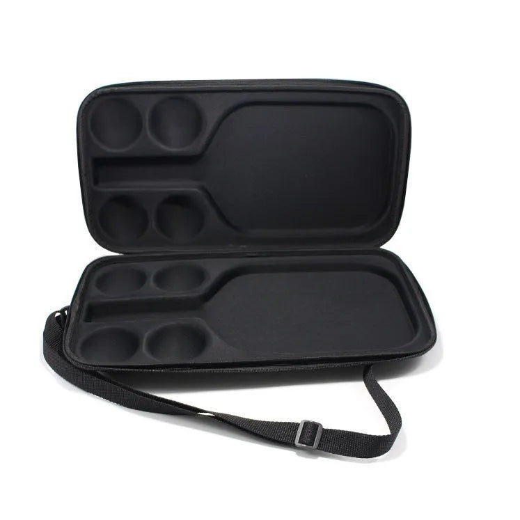Black waterproof EVA pickleball bag with two shoulder straps, shown holding one paddle and four balls.