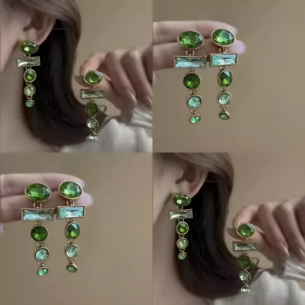 Pair of green gradient geometric alloy earrings with a tassel and inlaid zircon stone details on a white background.