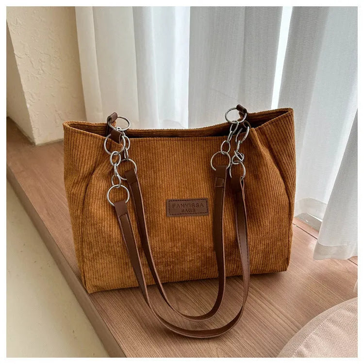 Corduroy one-shoulder tote handbag in black, white or brown with three-dimensional pocket