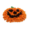 Orange pumpkin-shaped dog snuffle mat with textured surface for slow feeding and scent work training.