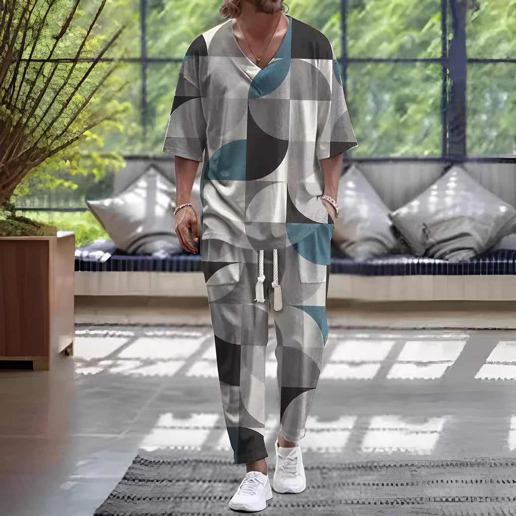 Lightweight cropped sleeve V-neck top and matching trousers suit in a solid colour.