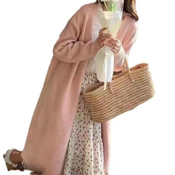 Women's loose fit V-neck knitted cardigan in khaki colour, showing medium length and long sleeves.