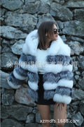 Women's loose artificial fur coat with detachable hood in street fashion style.